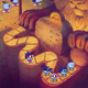 Creatures cross a bridge in Zoombinis.